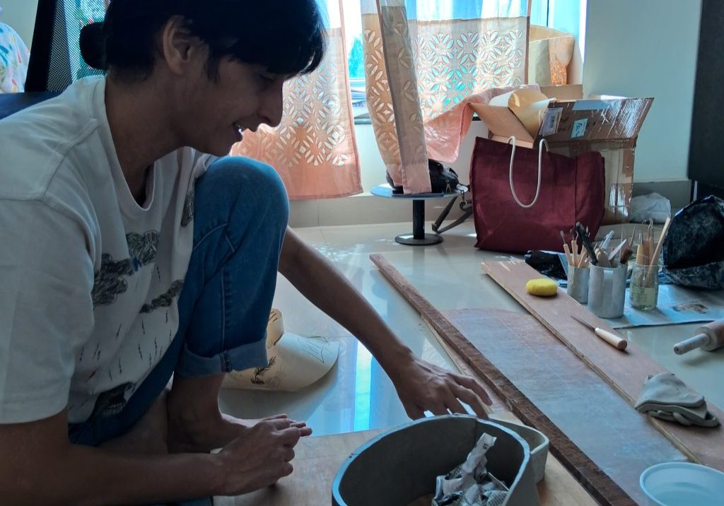 Nandita prepping clay