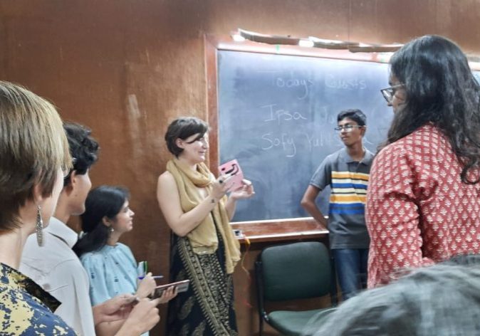 Sofy and particpants sharing carbon paint circuit zines at IISc